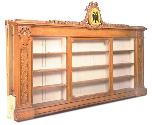 A NEAR PAIR OF VICTORIAN SIMULATED OAK OPEN BOOKCASES