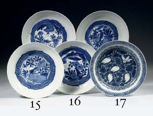 A pair of late Ming blue and white moulded saucer dishes