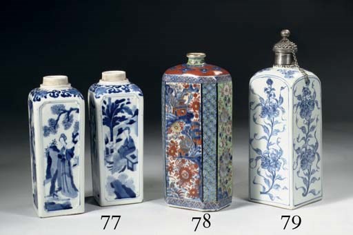 A pair of blue and white rectangular bottles