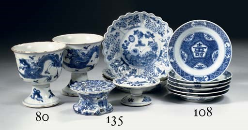 A pair of blue and white stemcups