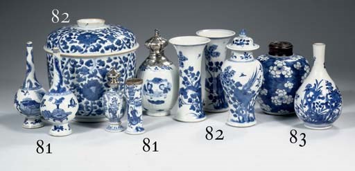 A blue and white oviform jar and wood cover, a pear-shaped bottle and a small vase