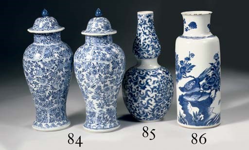 A pair of blue and white baluster jars and covers