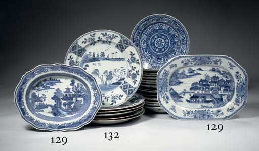 A set of four and a pair of blue and white plates