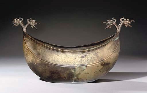A SAFAVID ENGRAVED BRASS KASHKUL