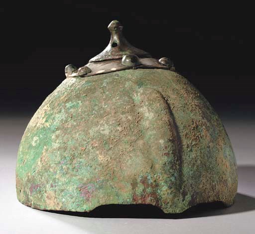 A BRONZE POST-SASSANIAN HELMET