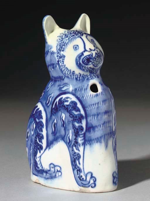 A SAFAVID BLUE AND WHITE SOFT PASTE PORCELAIN CAT