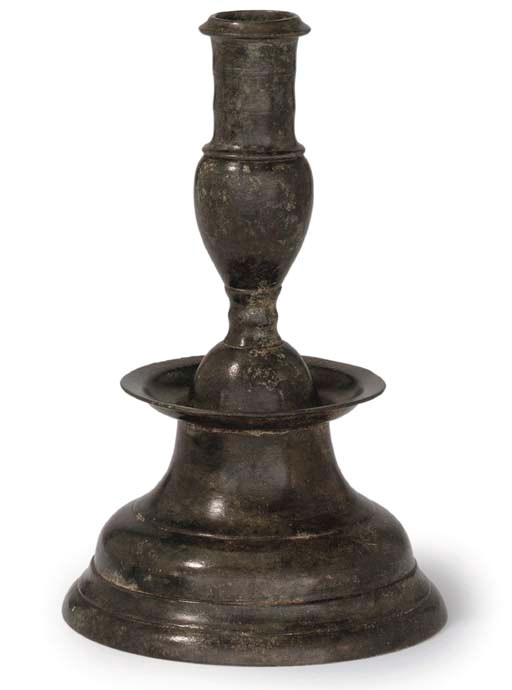 A VERY RARE TUDOR LOW BELL-BASED PEWTER CANDLESTICK