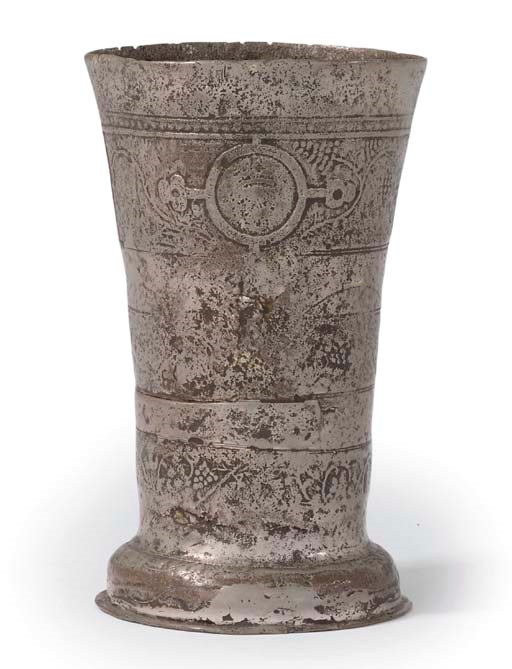 A RARE ENGLISH RELIEF CAST PEWTER BEAKER
