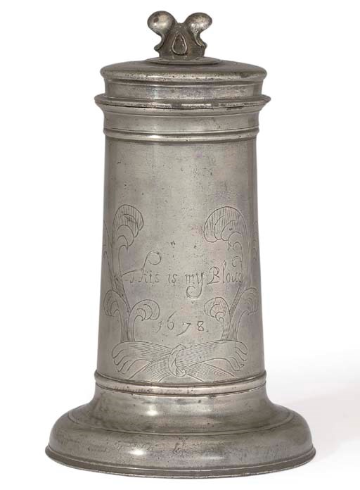AN ENGLISH PEWTER 'BEEFEATER' FLAGON