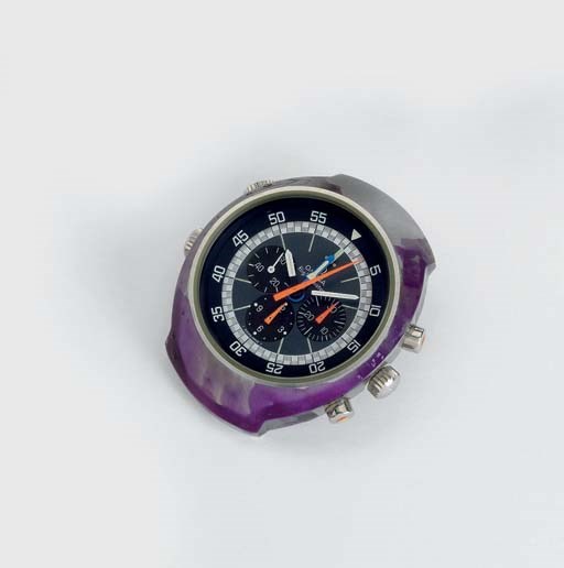Omega. An unusual stainless steel water-resistant tonneau-shaped two time zone aviator's chronograph wristwatch