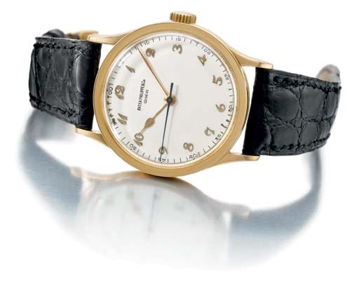 Patek Philippe. A very fine, large and rare 18K gold wristwatch with indirect sweep centre seconds and Breguet numerals