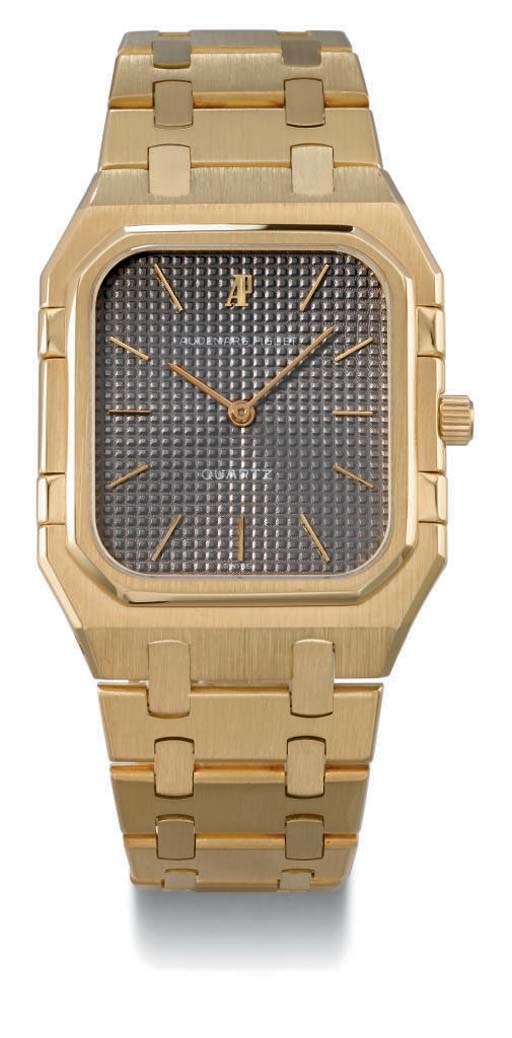 Audemars Piguet. An 18K gold octagonal wristwatch with bracelet
