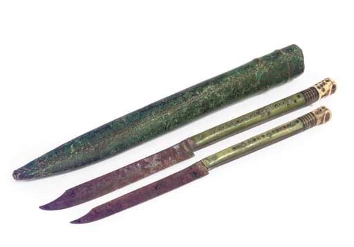 A GREEN STAINED BONE KNIFE SET