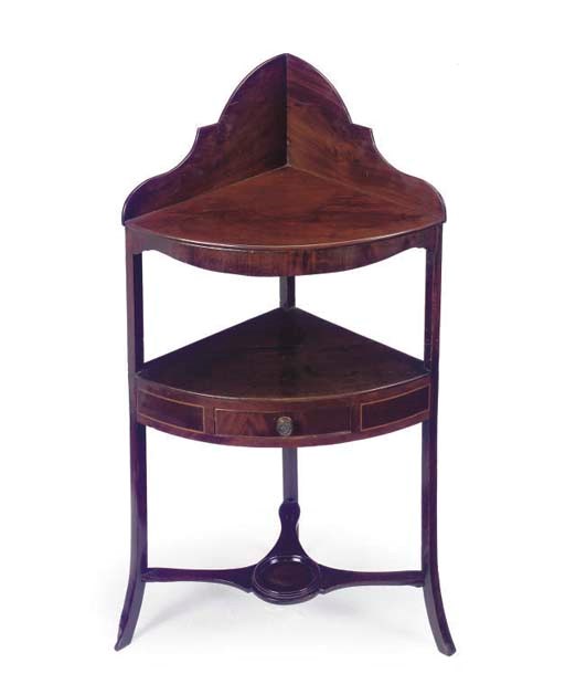 A REGENCY MAHOGANY AND LINE INLAID CORNER WASHSTAND