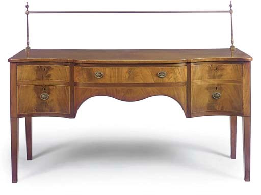 A MAHOGANY SERPENTINE SIDEBOARD