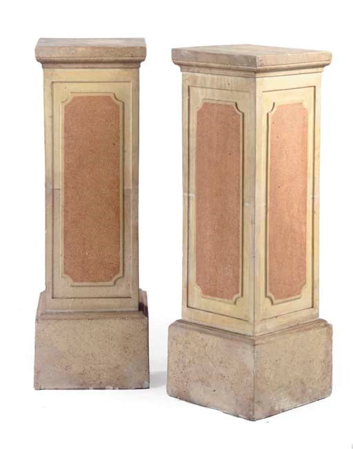 A PAIR OF DECORATED PLASTER PEDESTALS