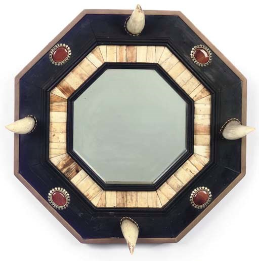 AN ENGLISH WHALE TOOTH, WHALEBONE AND HARDSTONE MOUNTED OCTAGONAL WALL MIRROR