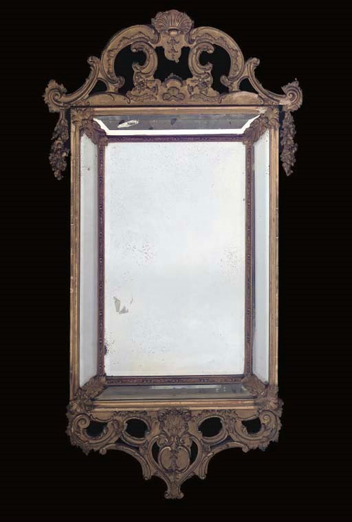 A NORTH EUROPEAN GILTWOOD MARGINAL MIRROR
