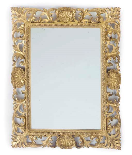 A FLORENTINE GILTWOOD MIRROR