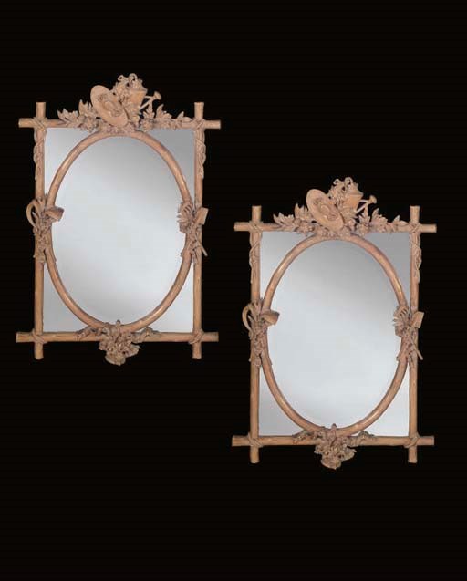 A PAIR OF COMPOSITION MIRRORS