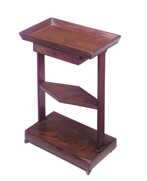 A FRENCH EMPIRE MAHOGANY VIDE-POCHE