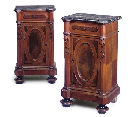 A PAIR OF GERMAN WALNUT BEDSIDE CABINETS