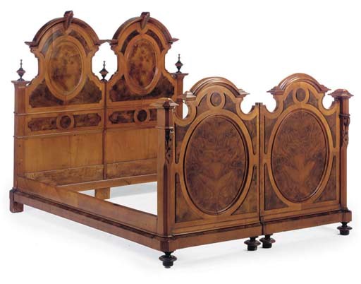 A GERMAN WALNUT DOUBLE BED