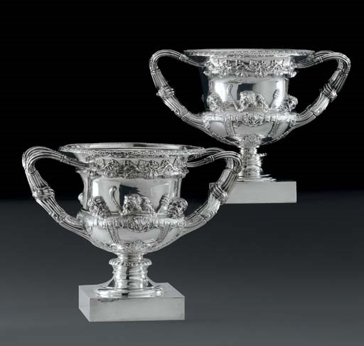 A PAIR OF GEORGE V SILVER WARWICK VASES
