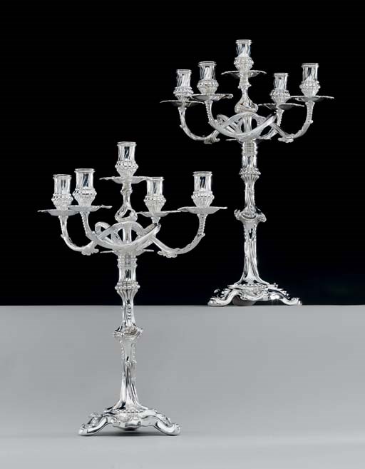 A PAIR OF SILVER VICTORIAN FIVE-LIGHT CANDELABRA