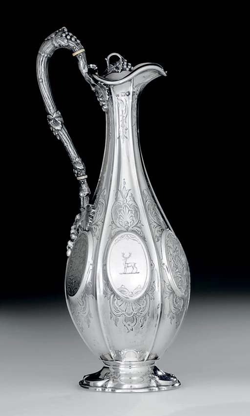 A VICTORIAN SILVER CLARET JUG**