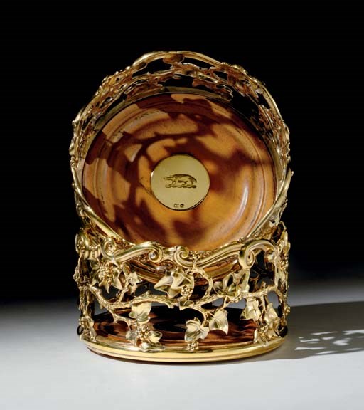 A FINE PAIR OF WILLIAM IV SILVER-GILT WINE COASTERS