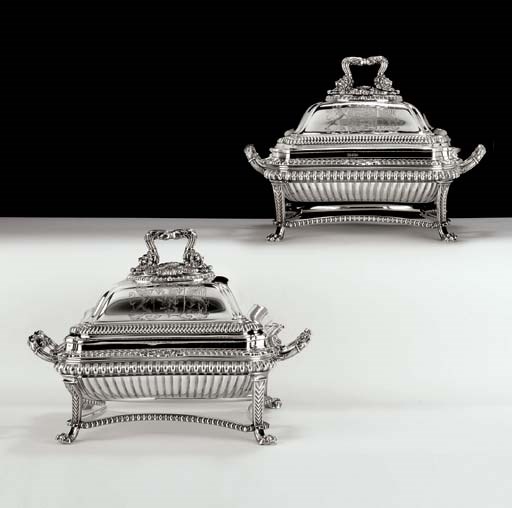 A FINE PAIR OF GEORGE III SILVER ENTREE DISHES WITH SHEFFIELD-PLATED WARMING STANDS