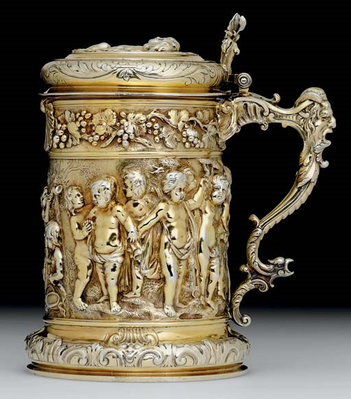 A GEORGE III SILVER-GILT TANKARD