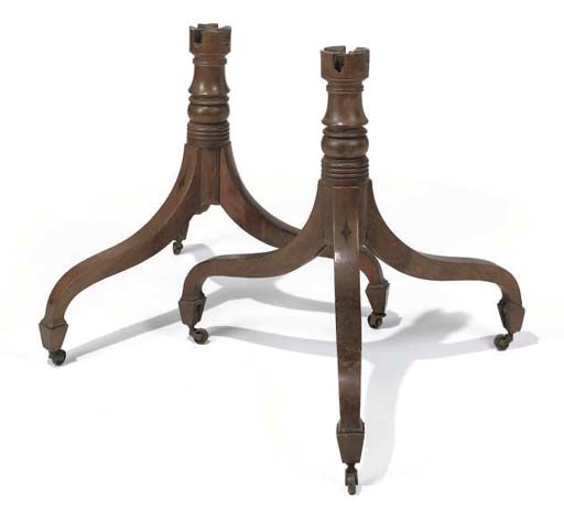 A pair of Regency mahogany globe stands,