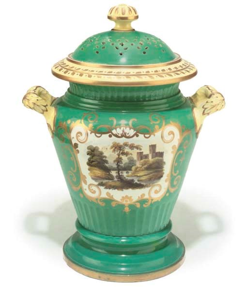 A large staffordshire green ground earthenware leech jar with perforated cover,