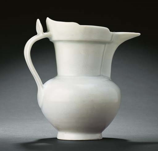A RARE EARLY MING TIANBAI GLAZED MONK'S CAP EWER, SENGMAOHU