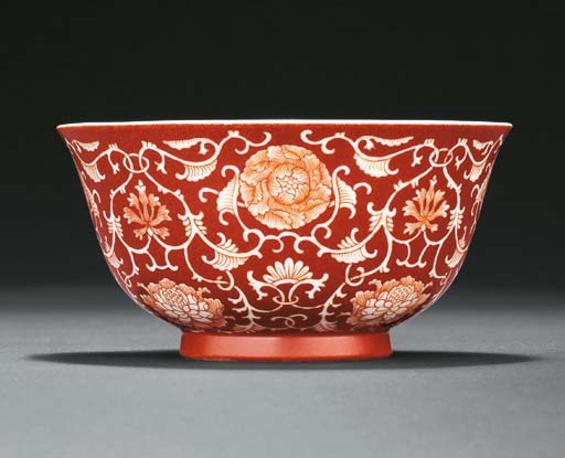 A FINE REVERSE-DECORATED CORAL-GROUND BOWL