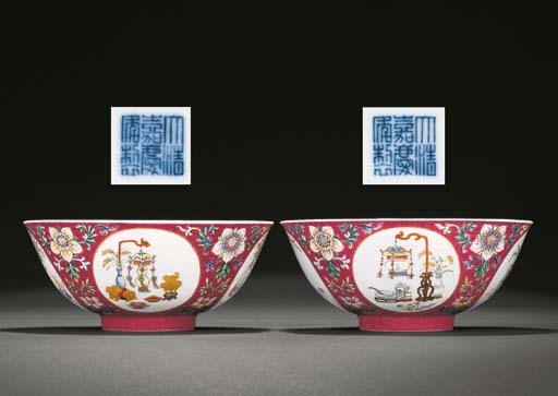 A FINE AND RARE PAIR OF FAMILLE ROSE RUBY-GROUND 'LANTERN' MEDALLION BOWLS