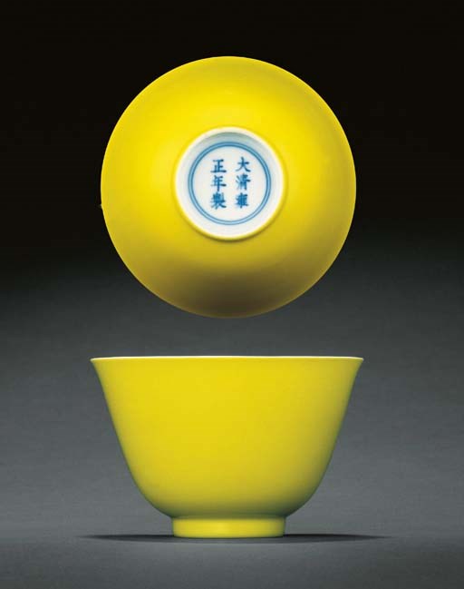 A FINE AND RARE LEMON-YELLOW ENAMELLED CUP