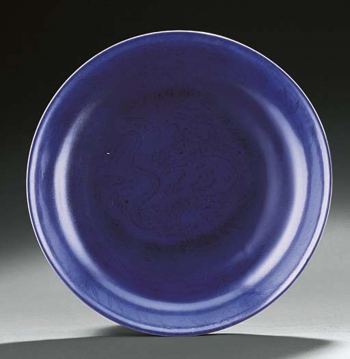 AN INCISED PURPLE-GLAZED 'DRAGON' DISH