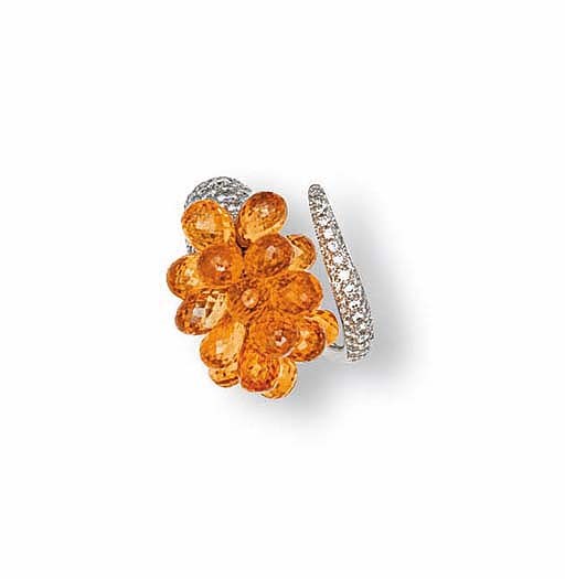 AN ORANGE BRIOLETTE SAPPHIRE AND DIAMOND 'ETNICO' RING, BY SCAVIA