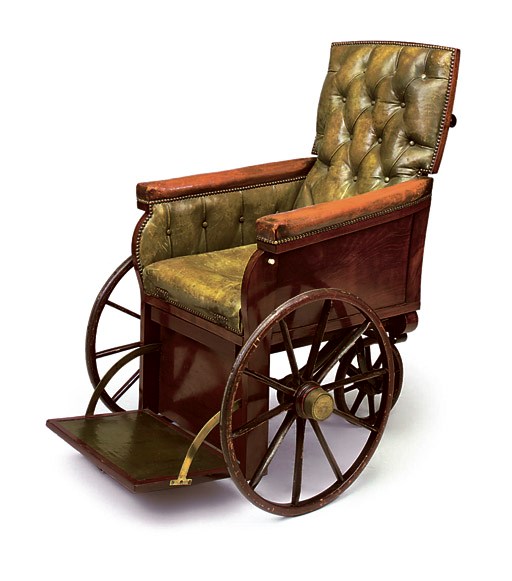 AN EARLY VICTORIAN MAHOGANY AND BEECH WHEELCHAIR