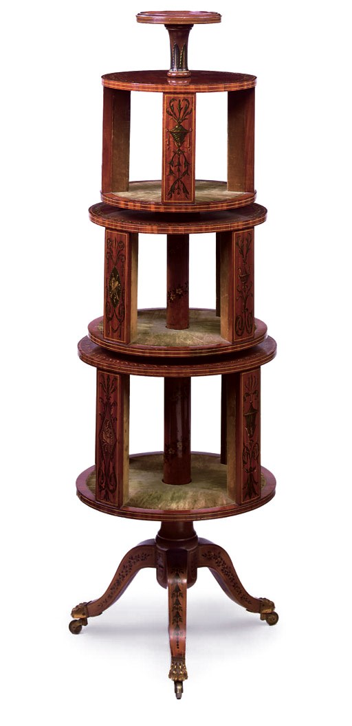 A LATE VICTORIAN PAINTED SATINWOOD THREE-TIER REVOLVING BOOKCASE