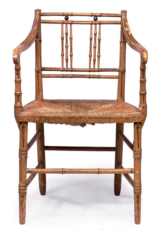 A REGENCY OCHRE-PAINTED SIMULATED-BAMBOO OPEN ARMCHAIR