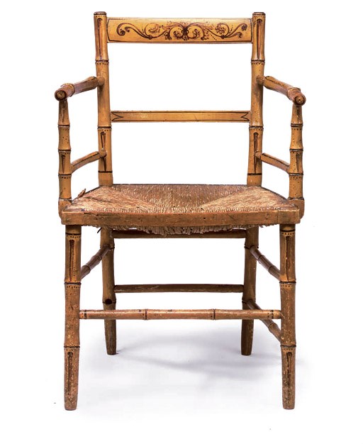 A REGENCY OCHRE-PAINTED SIMULATED-BAMBOO OPEN ARMCHAIR