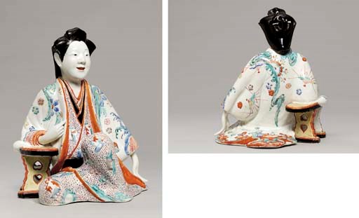 A KAKIEMON MODEL OF A SEATED Bijin