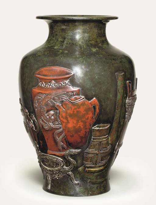 A BRONZE BALUSTER VASE