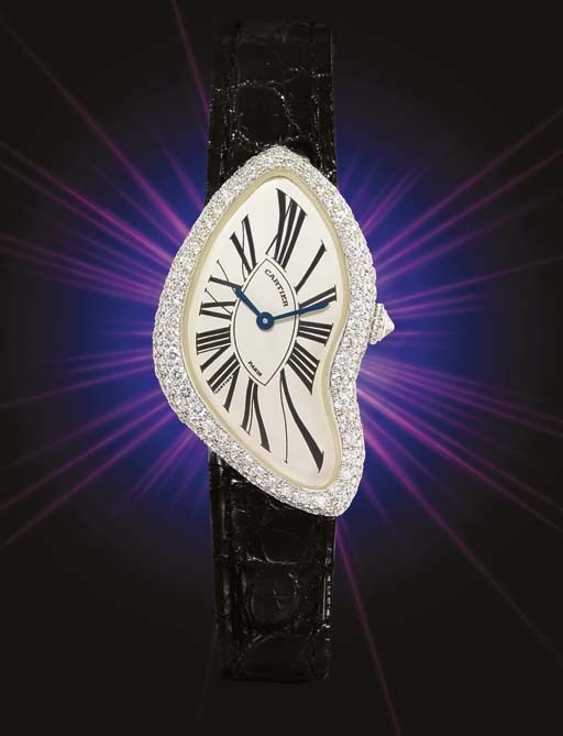 CARTIER. A FINE AND RARE LADY'S 18K WHITE GOLD AND DIAMOND-SET ASYMMETRIC WRISTWATCH
