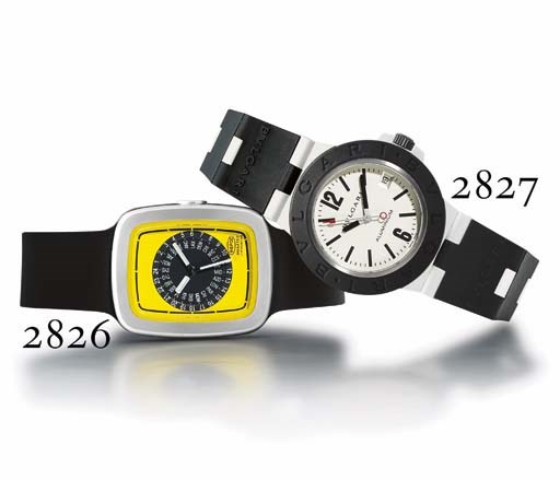 IKEPOD. A LIMITED EDITION STAINLESS STEEL AND RUBBER RECTANGULAR AUTOMATIC WORLD TIME WRISTWATCH WITH CENTRE SECONDS