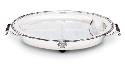 A GEORGE III SILVER VENISON-DISH